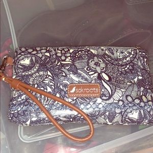 Sakroots clutch w/ built in portable power bank